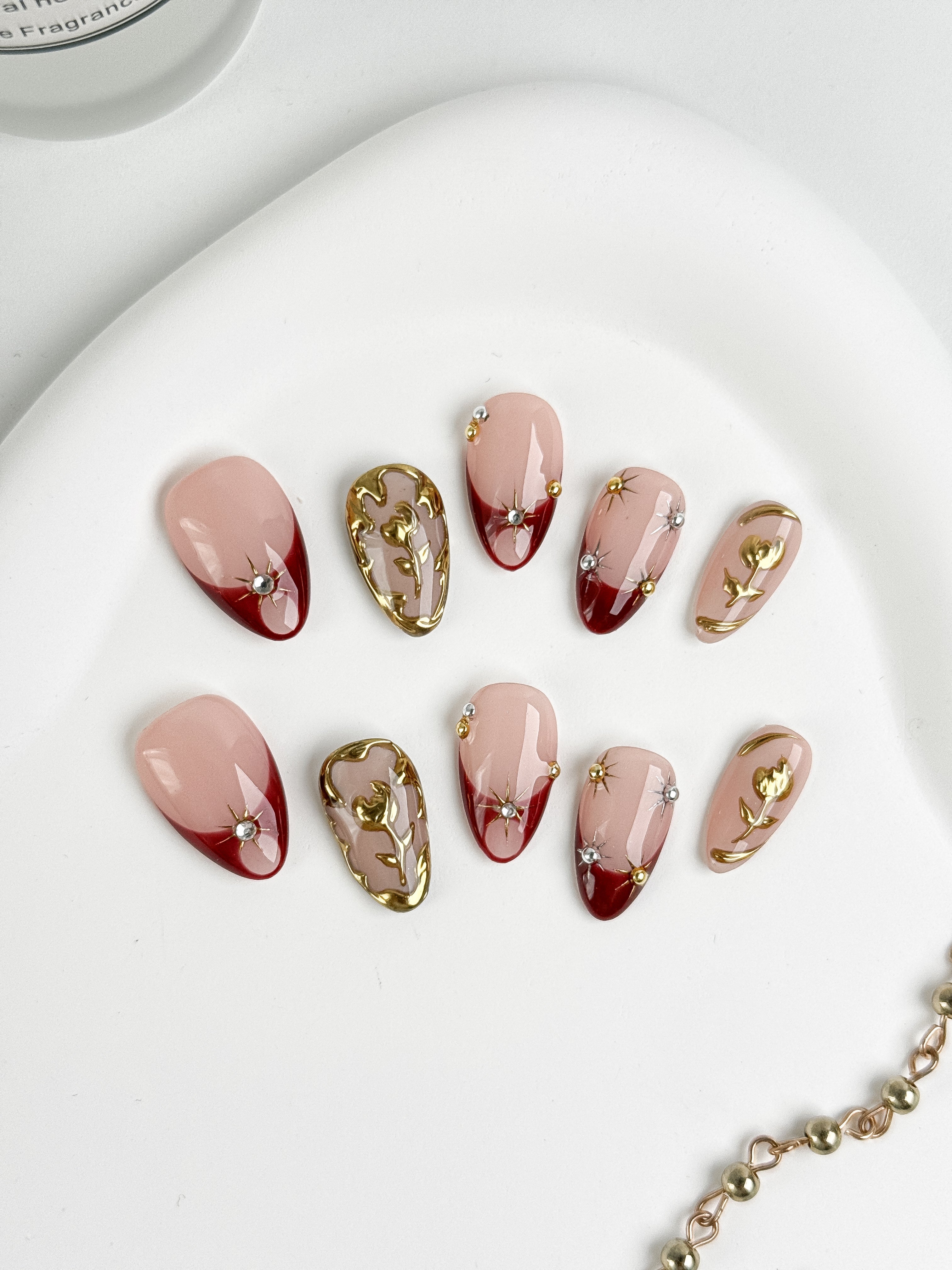 Golden Rose press-on nails flat lay