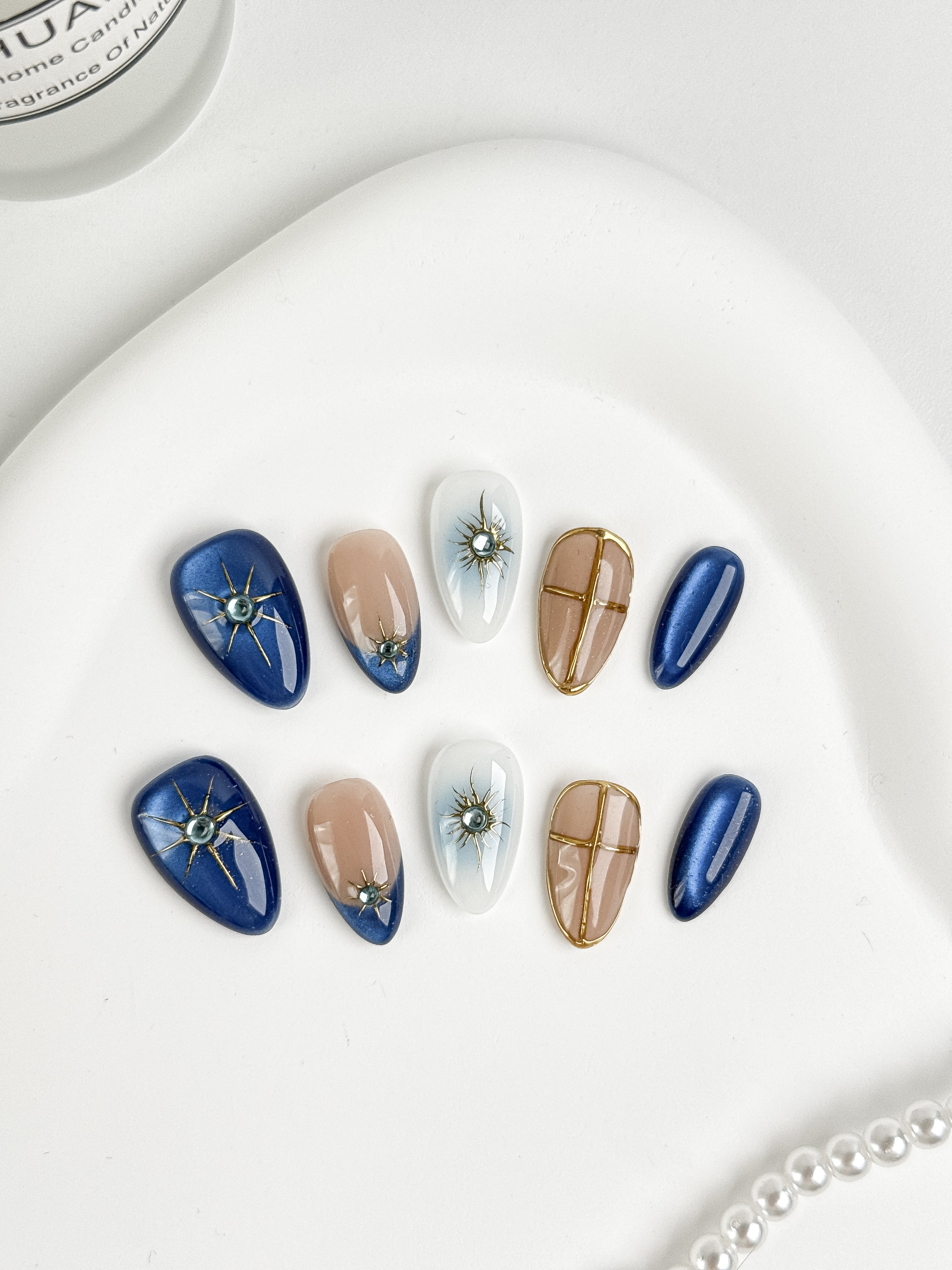 Sapphire Sky press-on nails flat lay