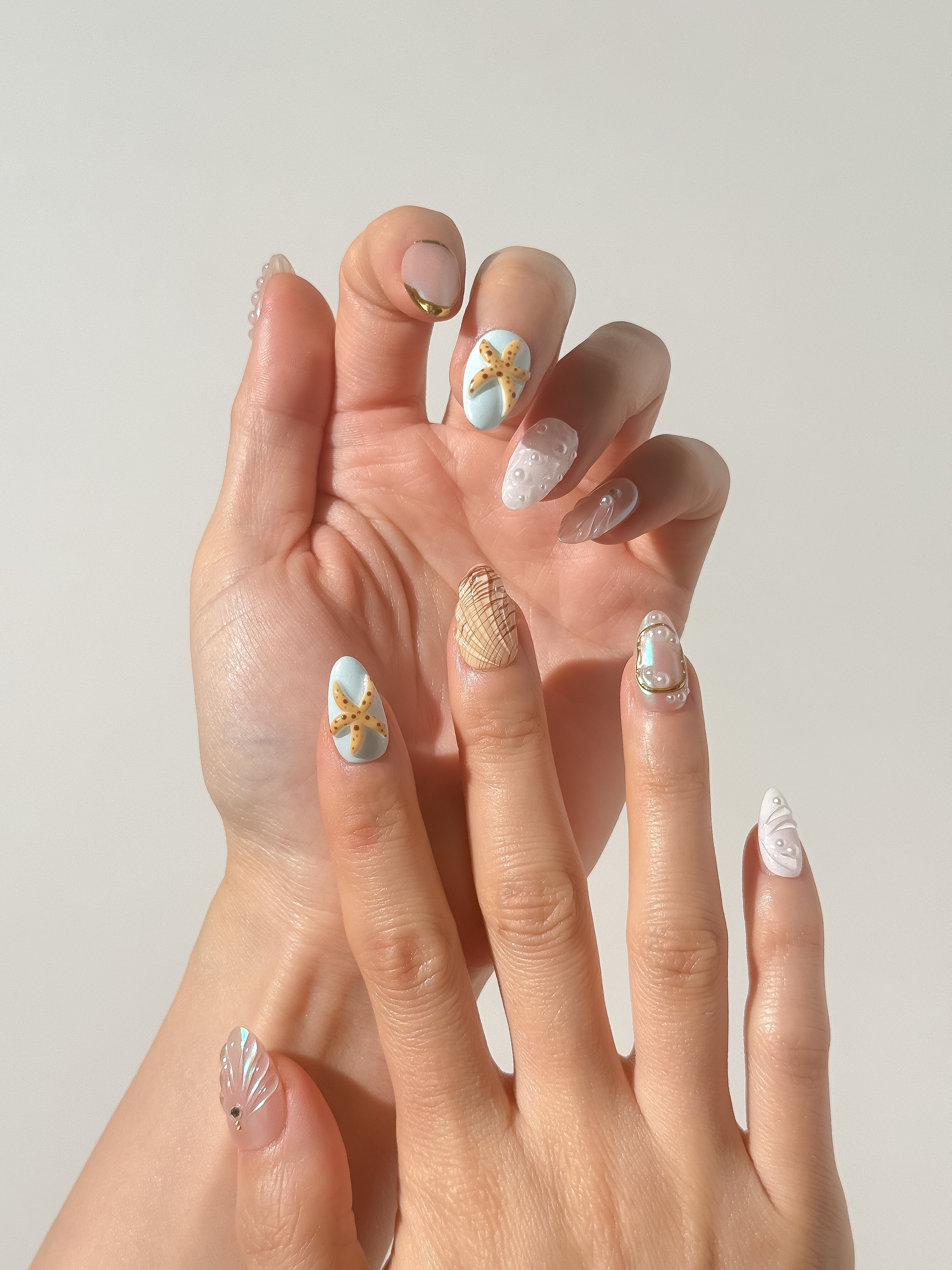 Pearl Tide press-on nails on hand