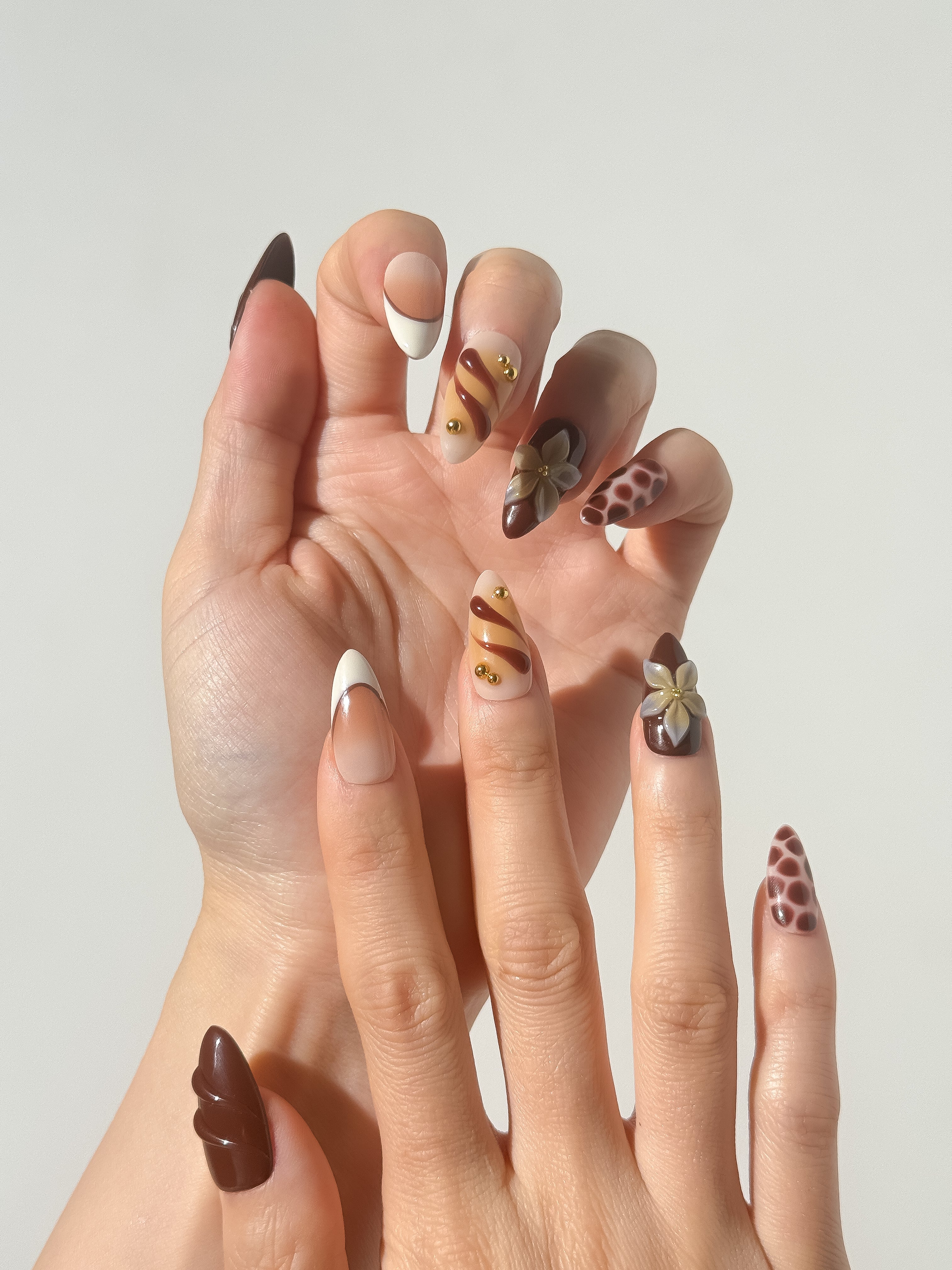 Cocoa & Gold Reverie press-on nails lifestyle